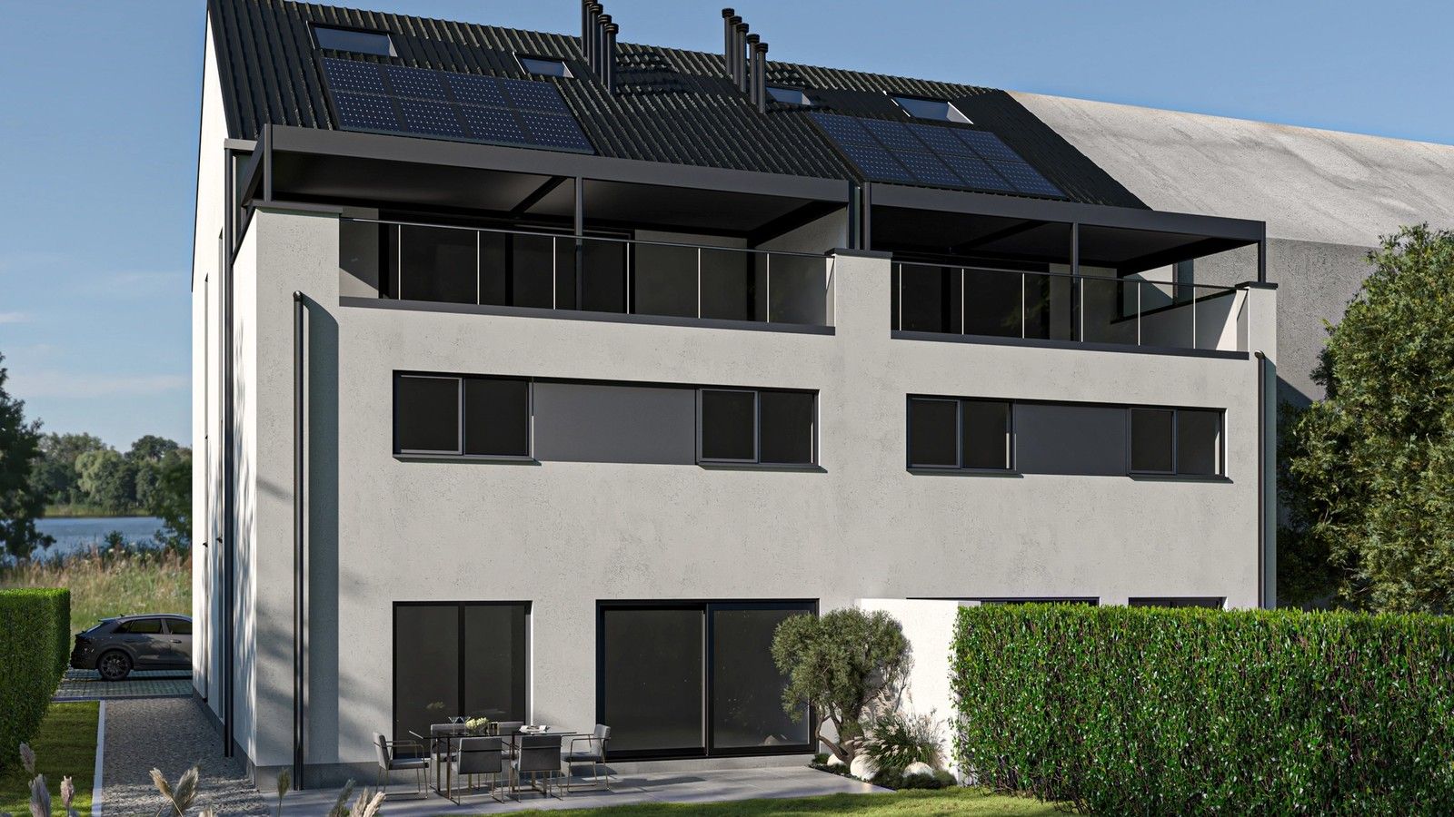 Façade arrière d’un immeuble de six appartements à Oupeye, avec grandes baies vitrées, terrasses superposées, pergolas bioclimatiques et panneaux photovoltaïques en toiture.