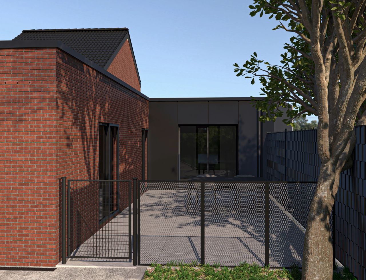 Détail de la terrasse et de l’extension contemporaine d’une maison à Herstal, avec façade sombre, briques rouges et grandes baies vitrées.