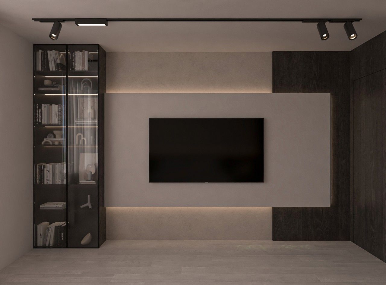 Mur TV sur mesure dans la chambre avec bibliothèque vitrée et éclairage intégré.