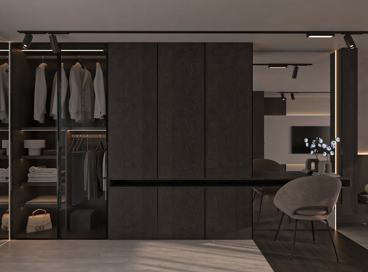 Dressing sur mesure avec vitrines, rangement ouvert et coiffeuse intégrée.