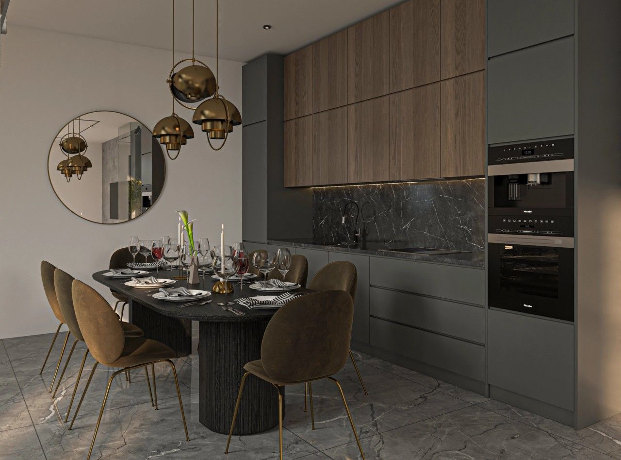 Vue de la cuisine et de la salle à manger d’un appartement contemporain à Verviers, avec mobilier gris foncé et bois, crédence en pierre sombre et suspensions dorées.